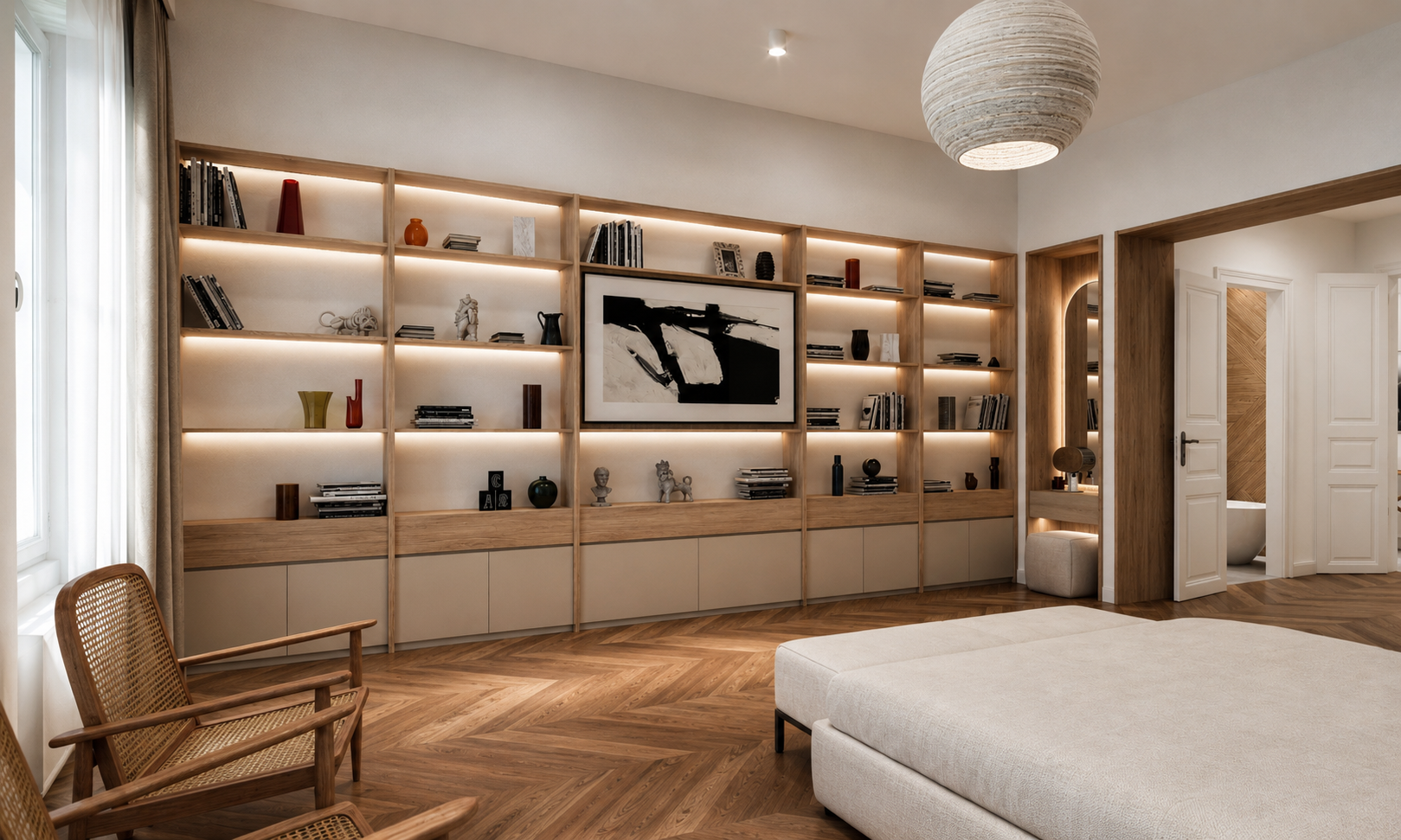 Opposite bedroom wall: floor-to-ceiling oak shelving with concealed LED in each bay, sand-coloured drawer units below, a dressing niche with an arched mirror to the right