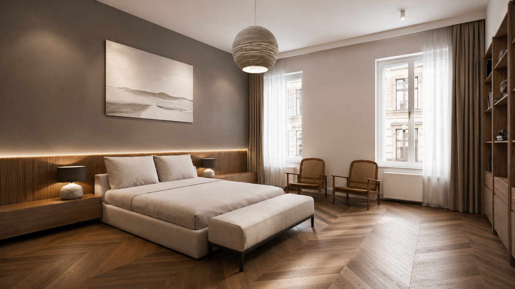 Bedroom: reeded oak panel behind the bed with a concealed LED strip, a built-in bedside band alongside, taupe painted wall, two cane armchairs by the window